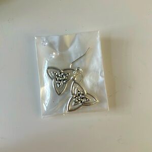 Unused silver earrings